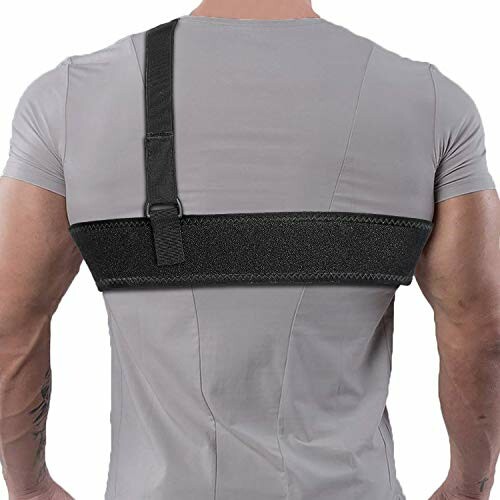 Person wearing a back posture corrector over a gray shirt.