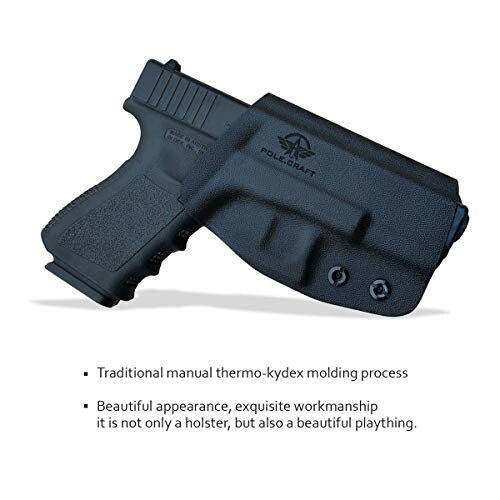 Black kydex gun holster with firearm.